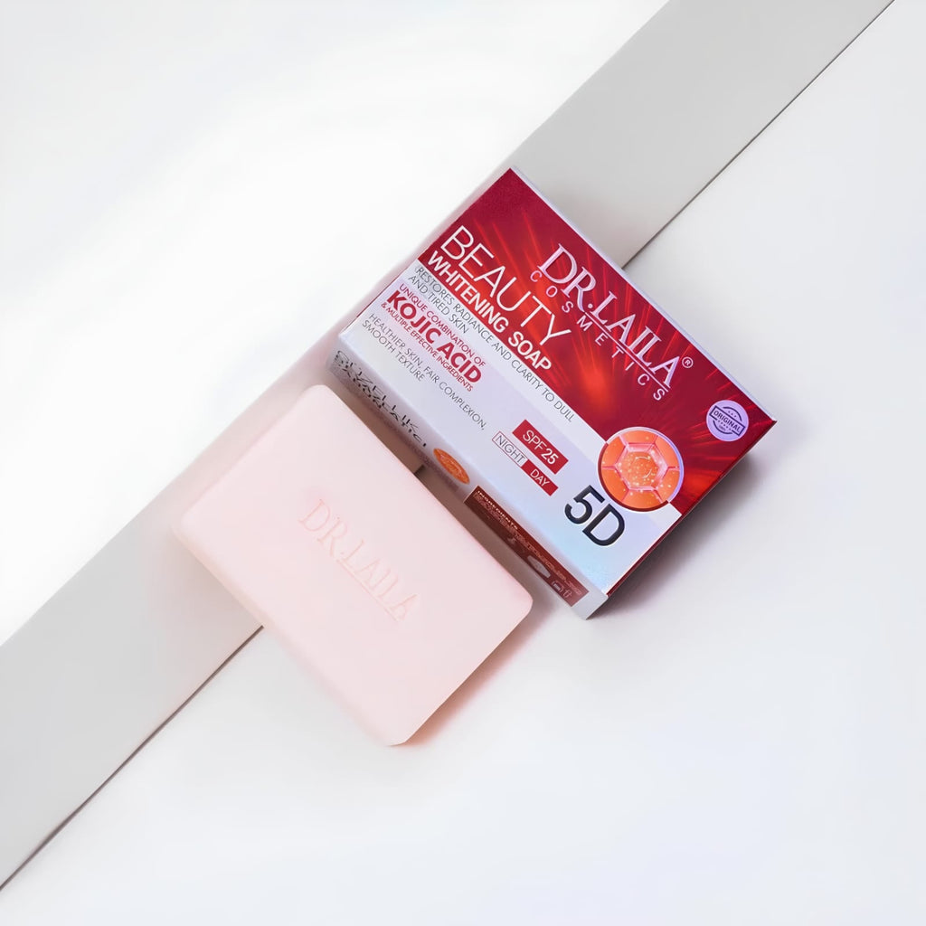 A bar of Dr. Laila Beauty Whitening Soap in Kojic Acid, shown next to its red and white packaging box on a clean, light gray geometric background.