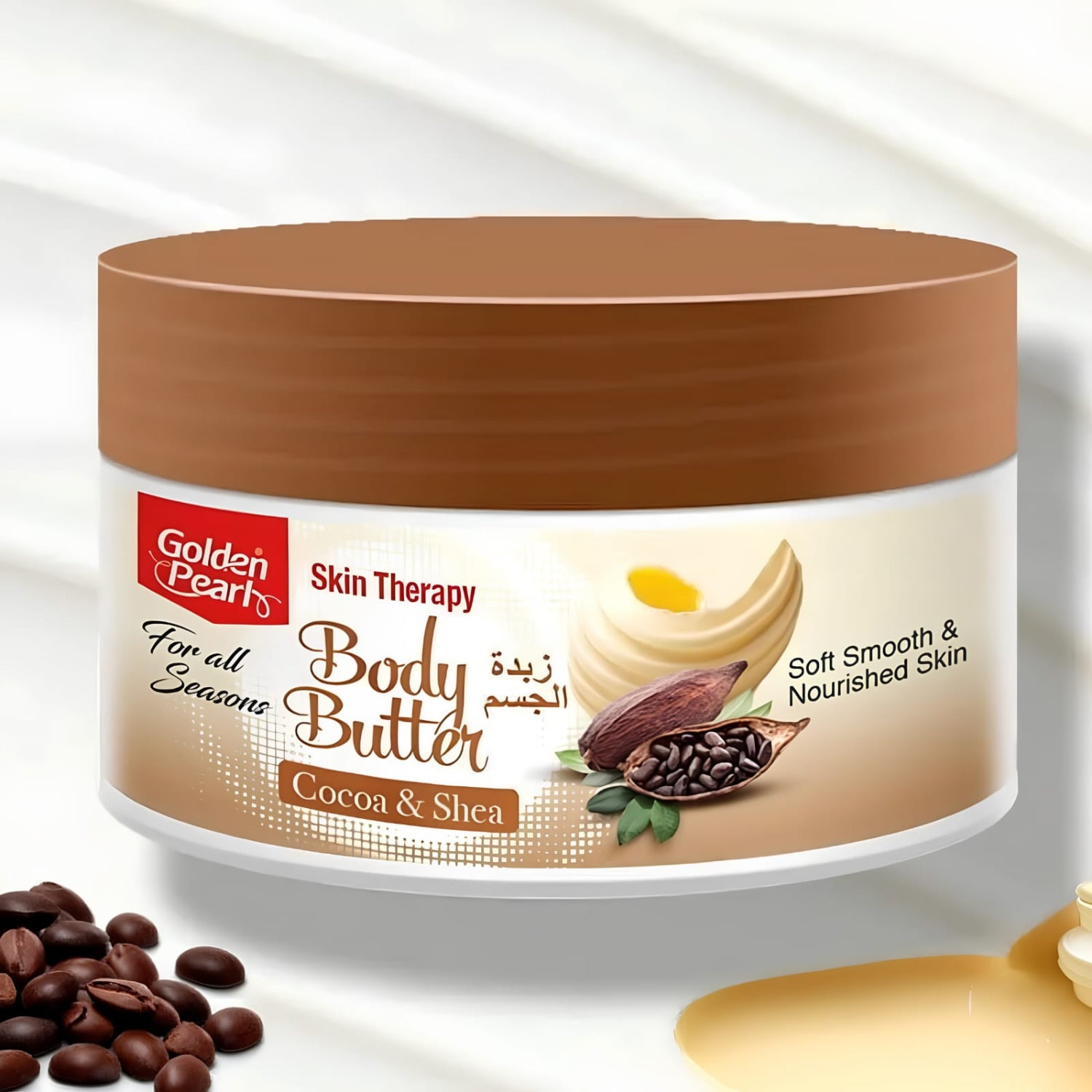 Golden Heart Body Butter in Cocoa & Shea scent, shown in a white jar with a brown lid, set against a clean white background with cocoa beans and a scoop of cream as props.